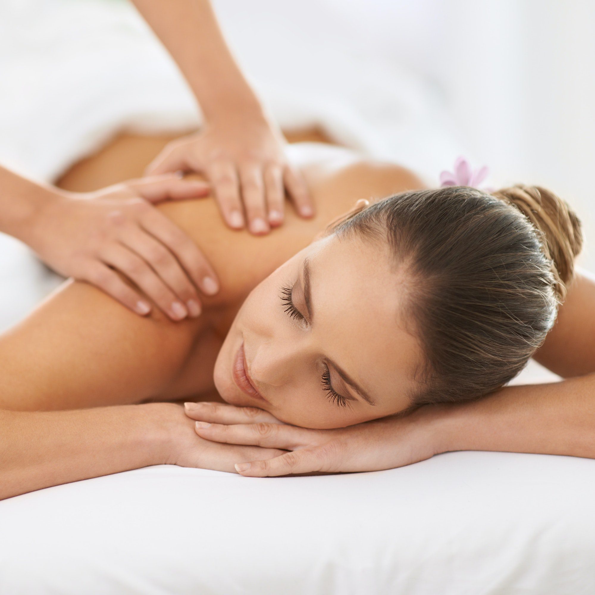 relaxed-by-magical-hands-cropped-shot-of-a-gorgeous-young-woman-enjoying-a-massage- relaxed by magical hands cropped shot of a gorgeous young woman enjoying a massage